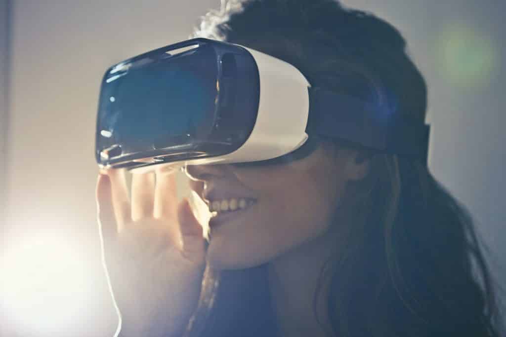 girl using virtual reality technology headset